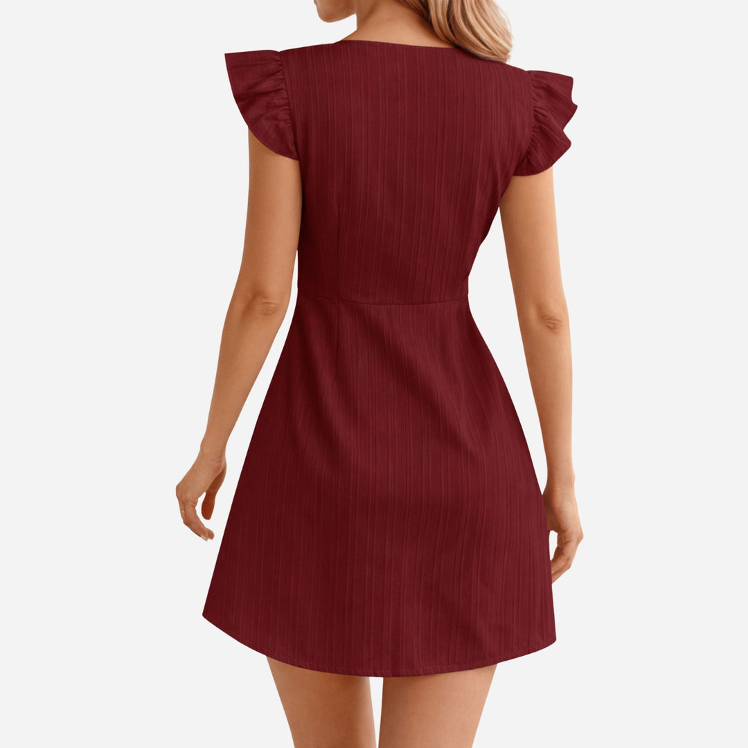 Emilia | Deep V-Neck Ruffle Hem Dress – Elegant Flowing Style