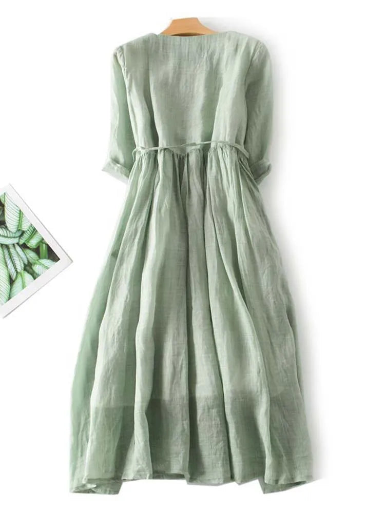 Amara vintage dress in Green by Cévora London