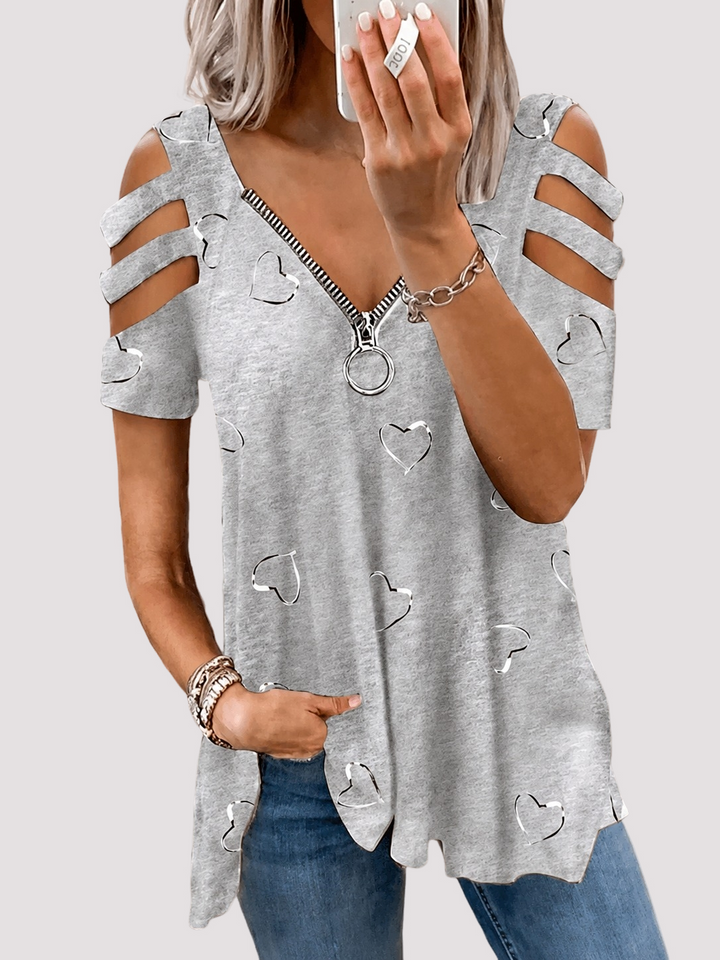 Ruby | Cut-Out Sleeve Top – Heart Print with Zipper Neckline
